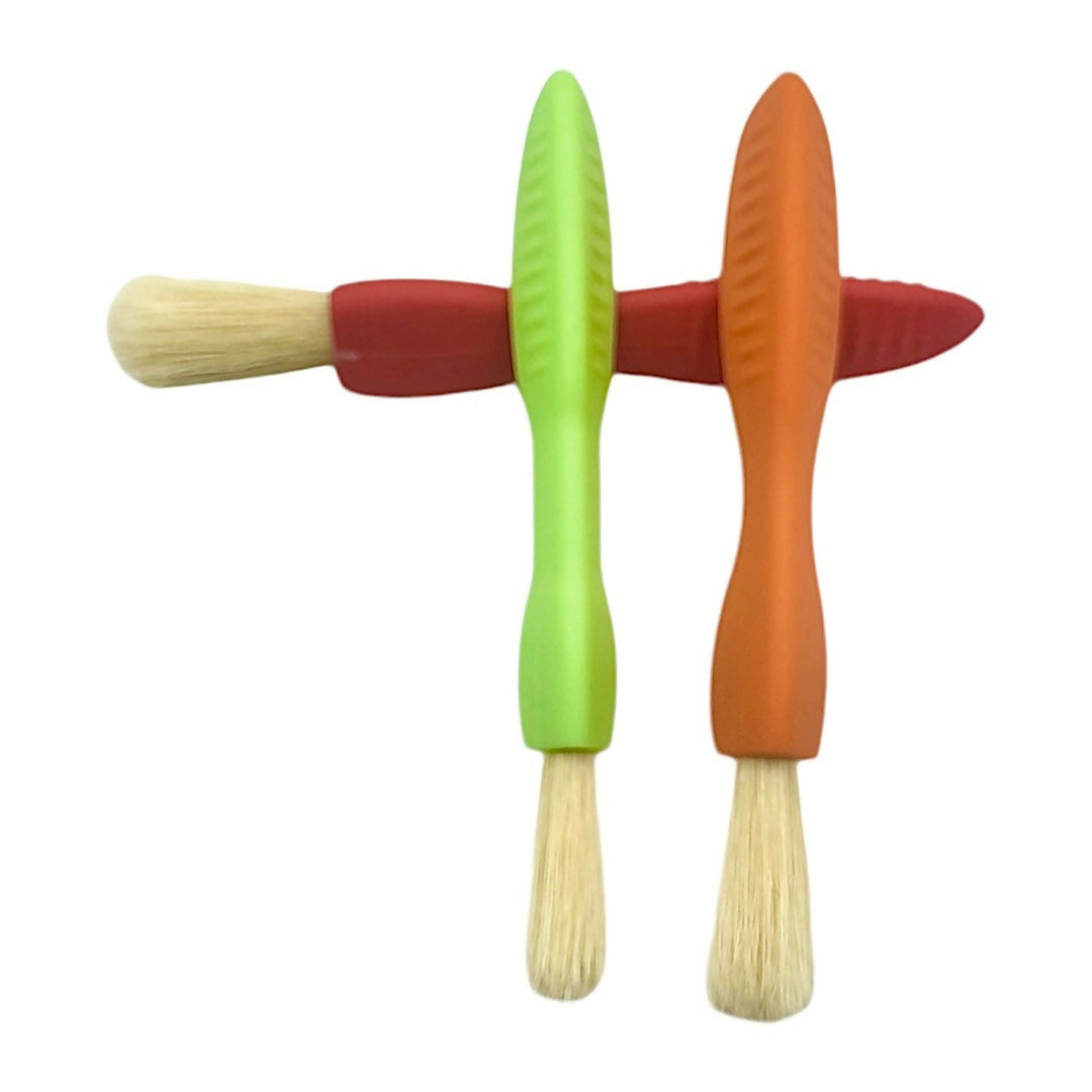 Set of 3 Triangle Easy Grip Paint Brushes in red, green, and orange, arranged in a V shape with ergonomic, non-roll handles.